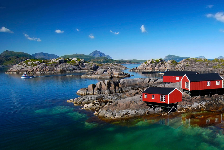 Typical Scandinavian log cabin set in a picturesque Fjord in Norway.