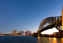 Australia Sydney Harbour at dusk, with bridge on foreground