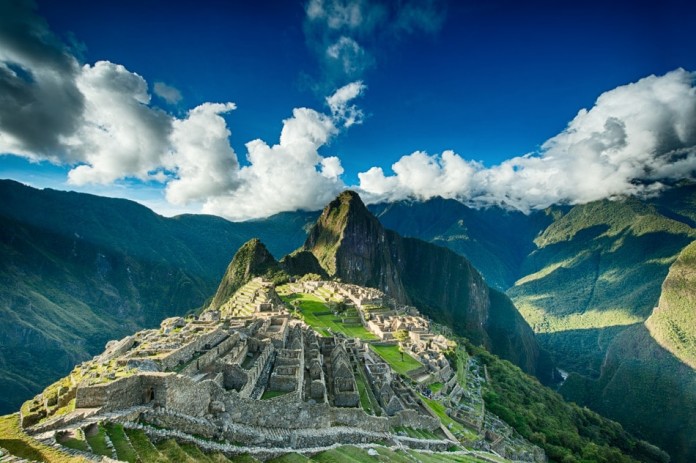 Machu Picchu is an Incan citadel set high in the Andes Mountains in Peru, above the Urubamba River valley.