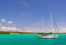 Galapagos Islands Yacht in the harbour of Puerto Villamil at Isabela Island in the Galapagos Islands in Ecuador